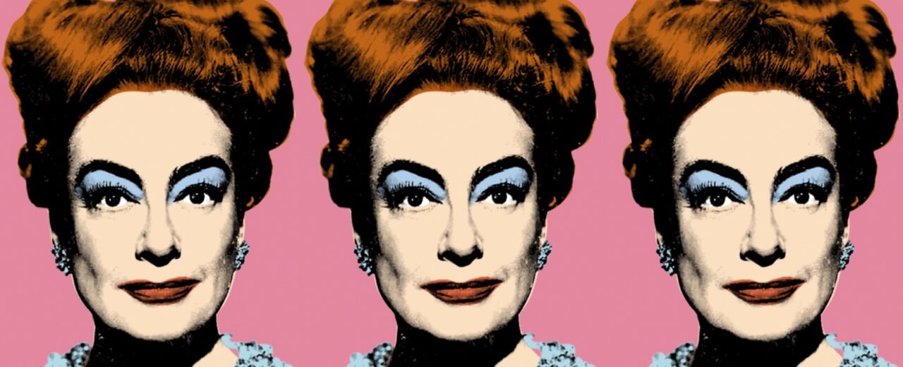 Pop art-style image showing three identical, stylized portraits of a woman with red hair, blue eye makeup, and a pink background.